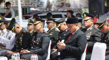 *Bupati Batu Bara Hadiri Upacara Malam Taptu dan Pimpin Ziarah ke Makam Pejuang*